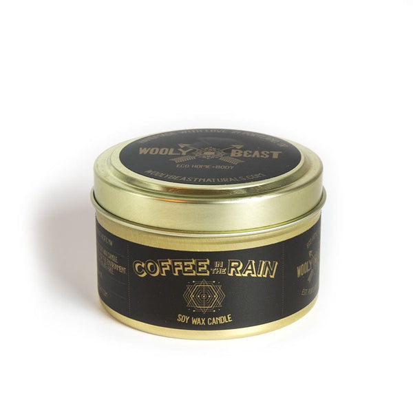 coffee in the rain soy candle in gold metal tin on white background black and gold label has sacred geometry design and reads Coffee in the Rain soy wax candle