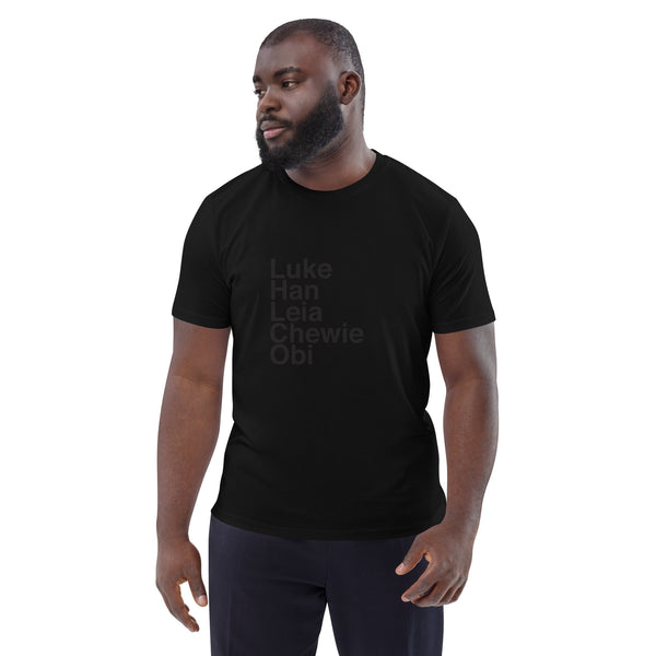 bearded BIPOC male wearing black star wars minimalist tee on white background, tshirt reads Luke Han Leia Chewie Obi